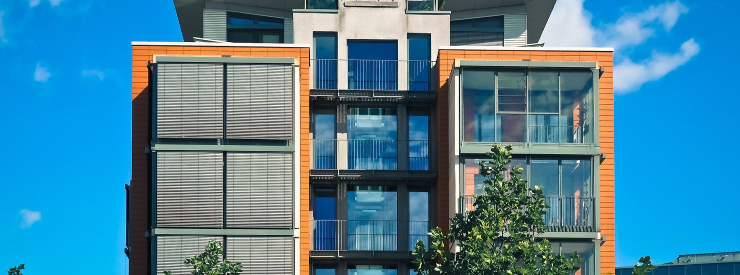 Tall building with a glass window